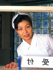 Horny Japanese nurse gives head to a patient