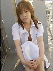 Brown-haired nurse Erika Aizawa showing asian charm