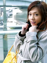 Slutty Mariko shows off her dark round nipples