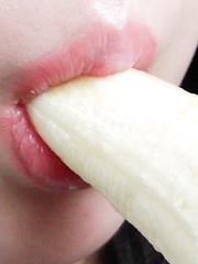 Machiko's tiny mouth could barely wrap around the hentai fruit and it didn't take long before she slowly pressed the banana against her perfect shaved pussy.