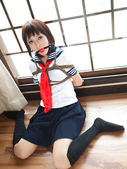 Dimdim Asian in school uniform is tied in ropes and canÂ´t scream