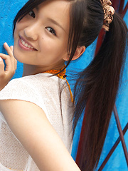 Shizuka Asian honey offers beautiful smile while posing outdoor