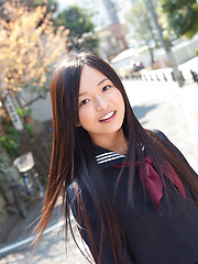 Mayumi Yamanaka Asian takes a walk in her city after classes