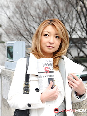 Super hot office lady Nao posing outdoors